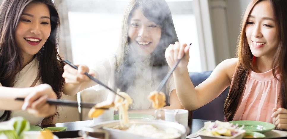 Japanese women eating hotpot.