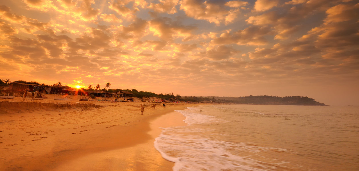 Sunrise over Candolim Beach in Goa, India