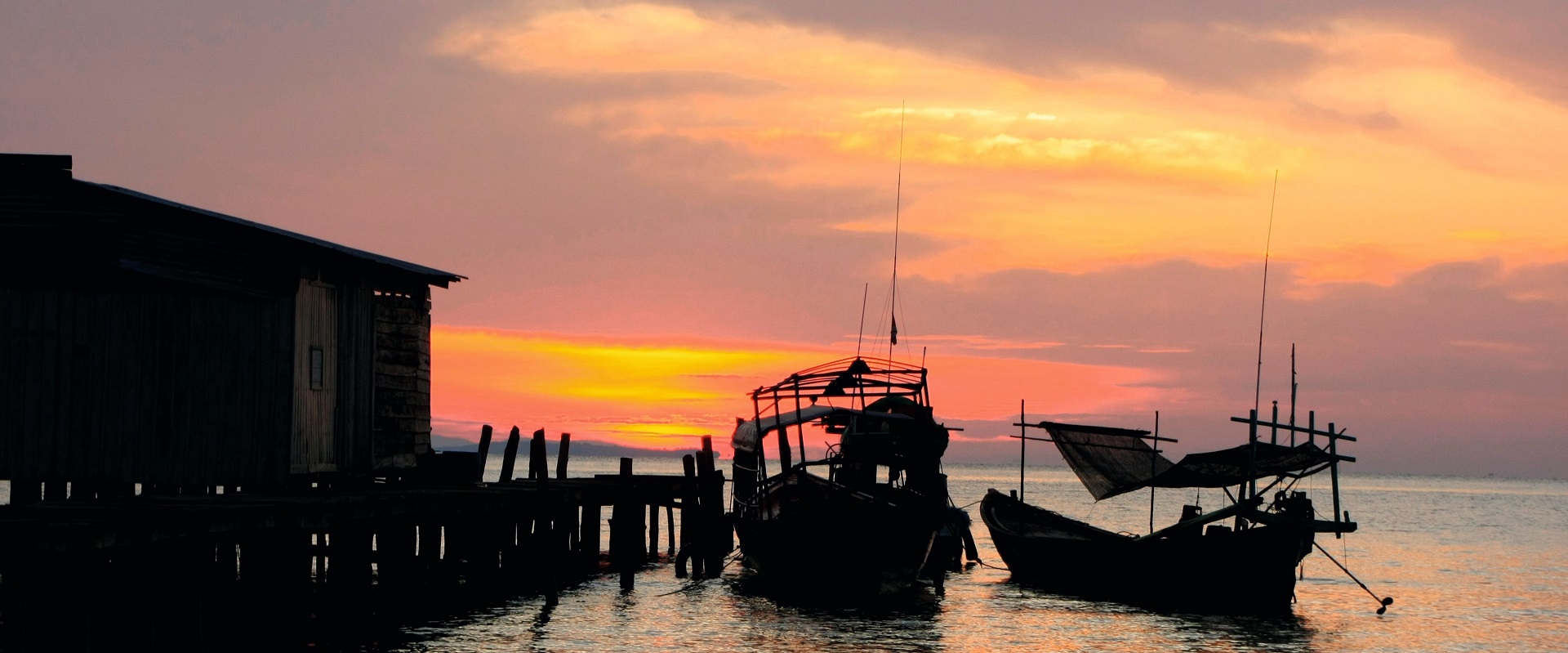 Boats at sunset in Koh Rong.