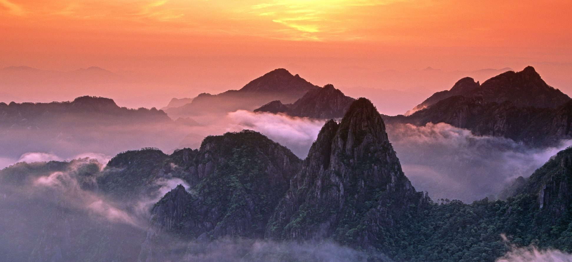 Misty sunrise over Mount Huangshan