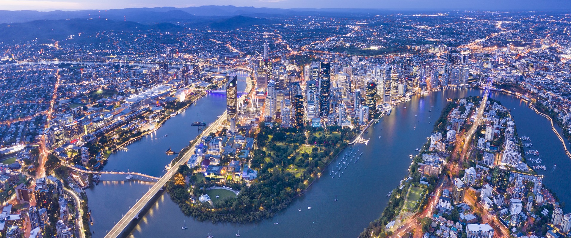 Brisbane's stunning skyline at night. Image: Getty